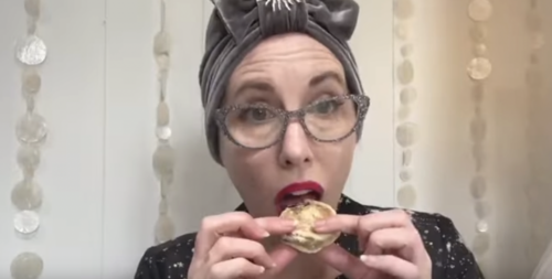 Gail Carriger Facebook Live Purple Food Eating biscuit both hands